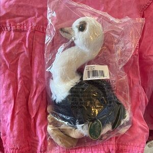 This is the Bearington Collection Plush White and Black Duck Toy